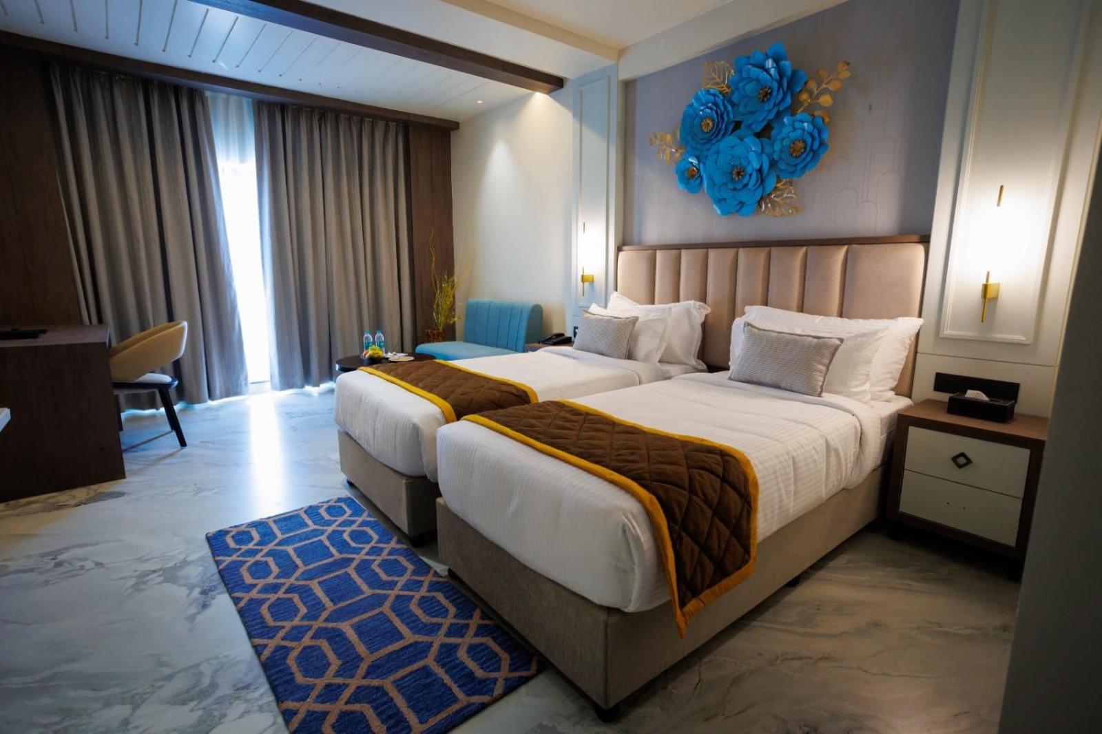 Aj Grand Elite Hotel มังคาลอร์ ภายนอก รูปภาพ